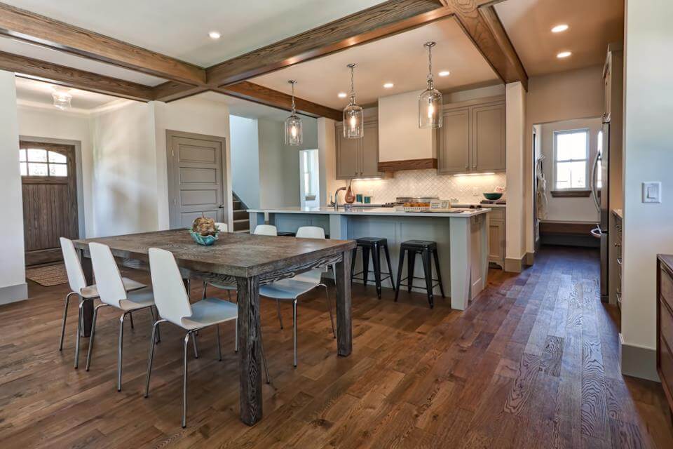 An image of a kitchen with hardwood floors